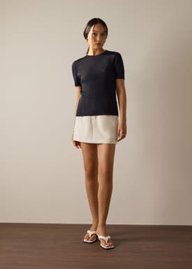Praveena Plisse Mock Neck Fitted Top